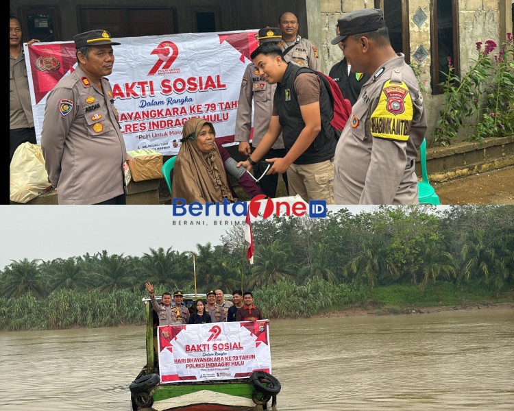 Susuri Sungai Indragiri, Polres Inhu Bawa Bantuan dan Harapan ke Desa Terpencil