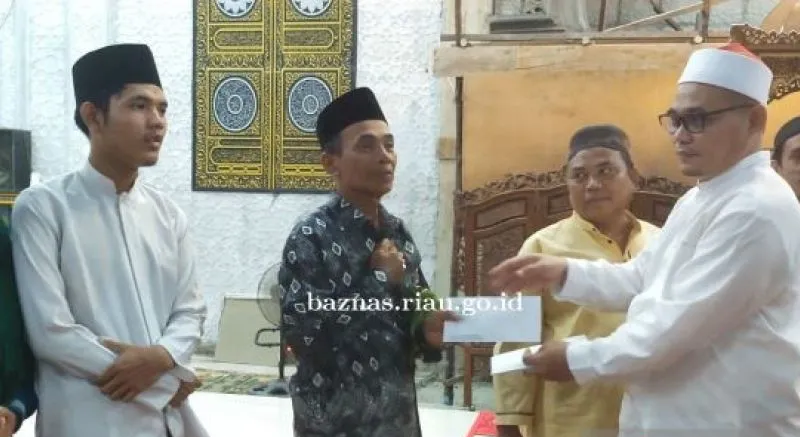 Baznas Riau Salurkan Santunan Idul Fitri 2022 ke 1.432 Mustahik