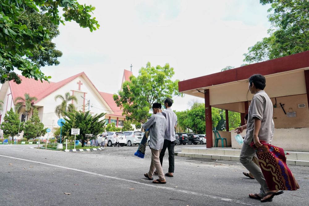 Begini Harmoni Toleransi Beragama saat Idulfitri di Pekanbaru Riau