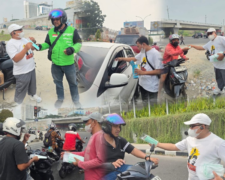 Kabut Asap Melanda, Matahari 08 Riau Turun ke Jalan Bagikan Ribuan Masker untuk Warga Pekanbaru