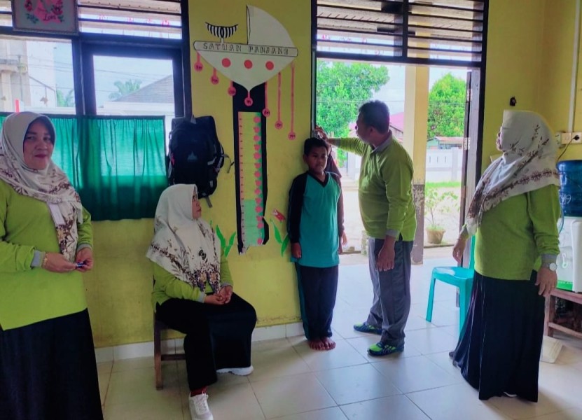 Komitmen Sehat, SDN 021 Pasir Kemilu Gelar Pemeriksaan Gratis hingga PSN