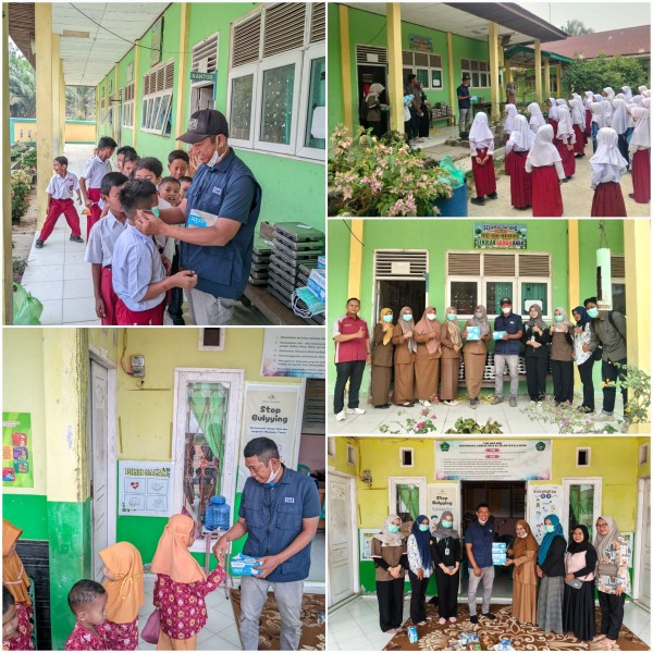 Peduli Kesehatan di Tengah Kabut Asap, PT Inecda Bagikan Masker untuk Guru dan Siswa